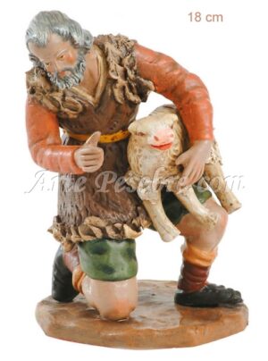 Pastor adorando con cordero