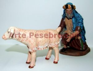 Pastor con borrega pariendo