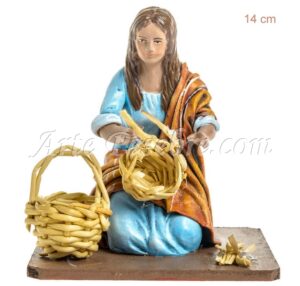 Pastora haciendo cestas