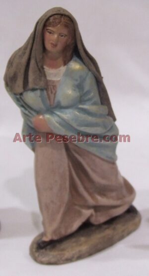 Pastora adorando con niño