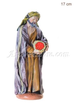 Pastor con cesto de frutas