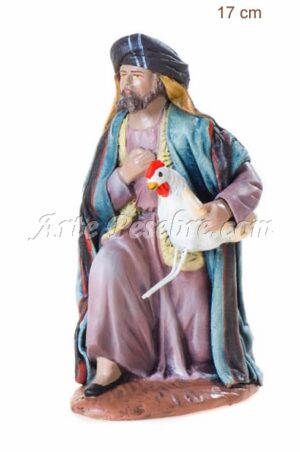 Pastor adorando con gallina