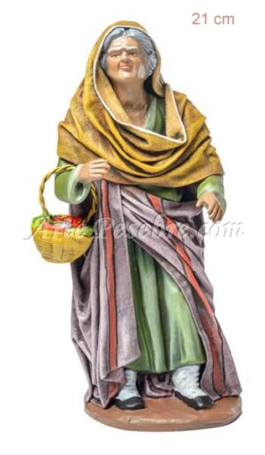 Pastora anciana con cesta al brazo