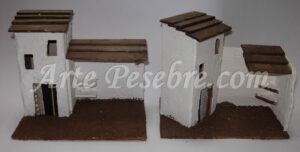 Casa blanca con cobertizo