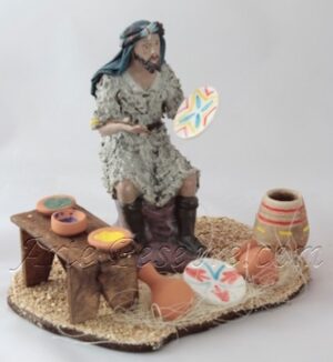 Pastor pintando cerámica