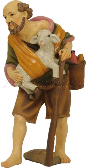 Pastor con bastón y cordero
