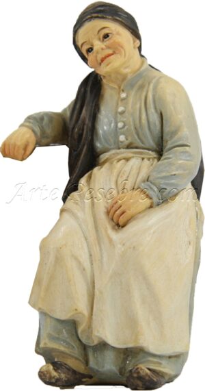 Pastora anciana sentada