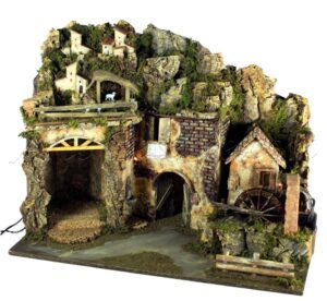 Portal con luces, casas y molino de agua con bomba