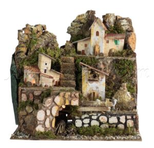 Paisaje de montaña con casas y luces