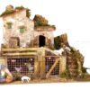 Casa con corral y animales, con pastor durmiendo y luces