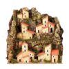 Paisaje de montaña con casas y luces