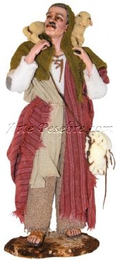 Pastor con cordero a la espalda