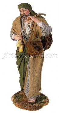 Pastor transportando quesos